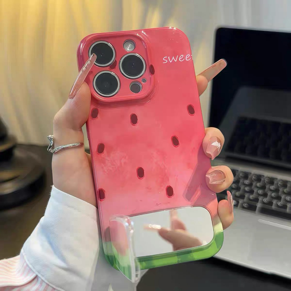Watermelon-themed phone case with mirror and kickstand