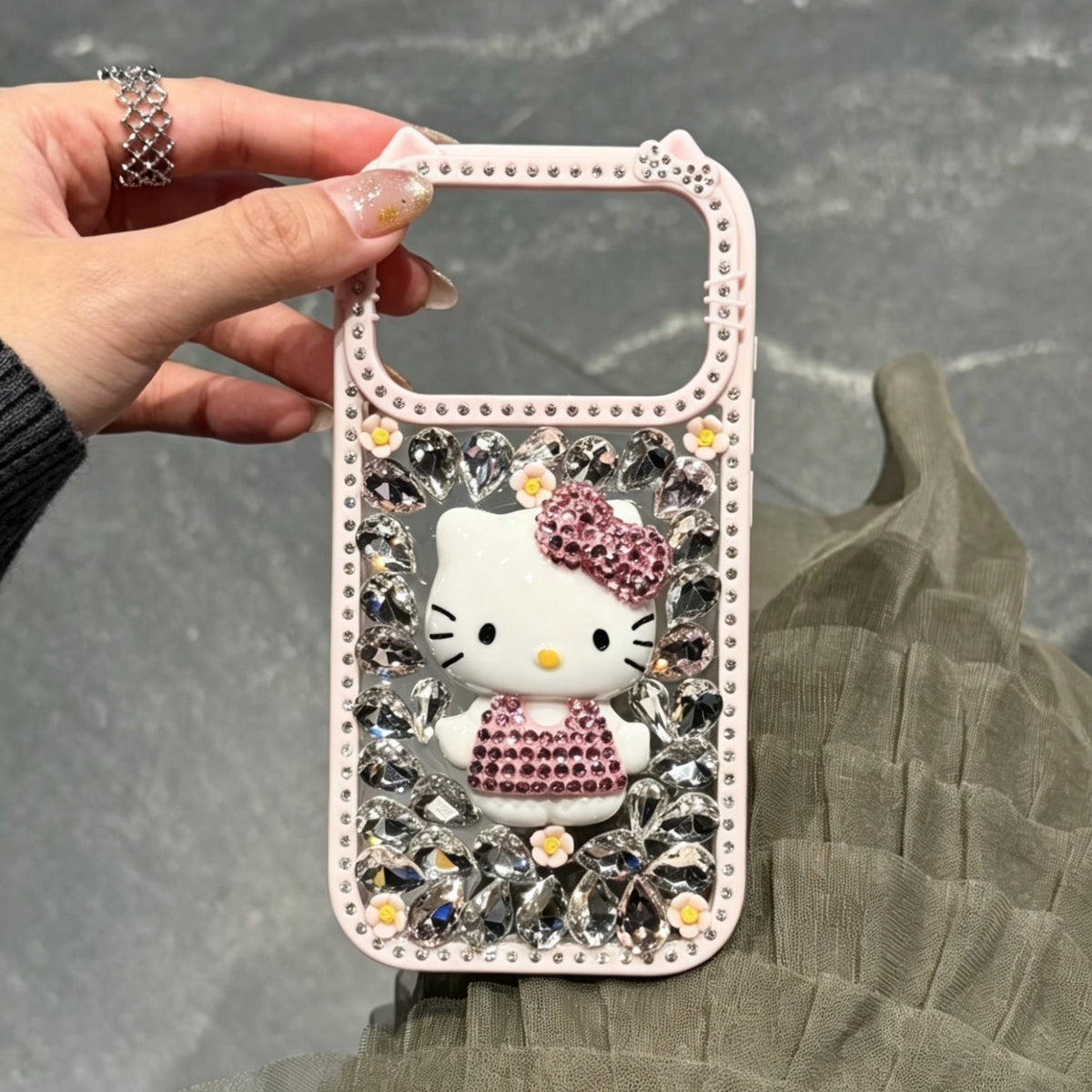 Cute rhinestone-studded Hello Kitty phone case (Instagram style)