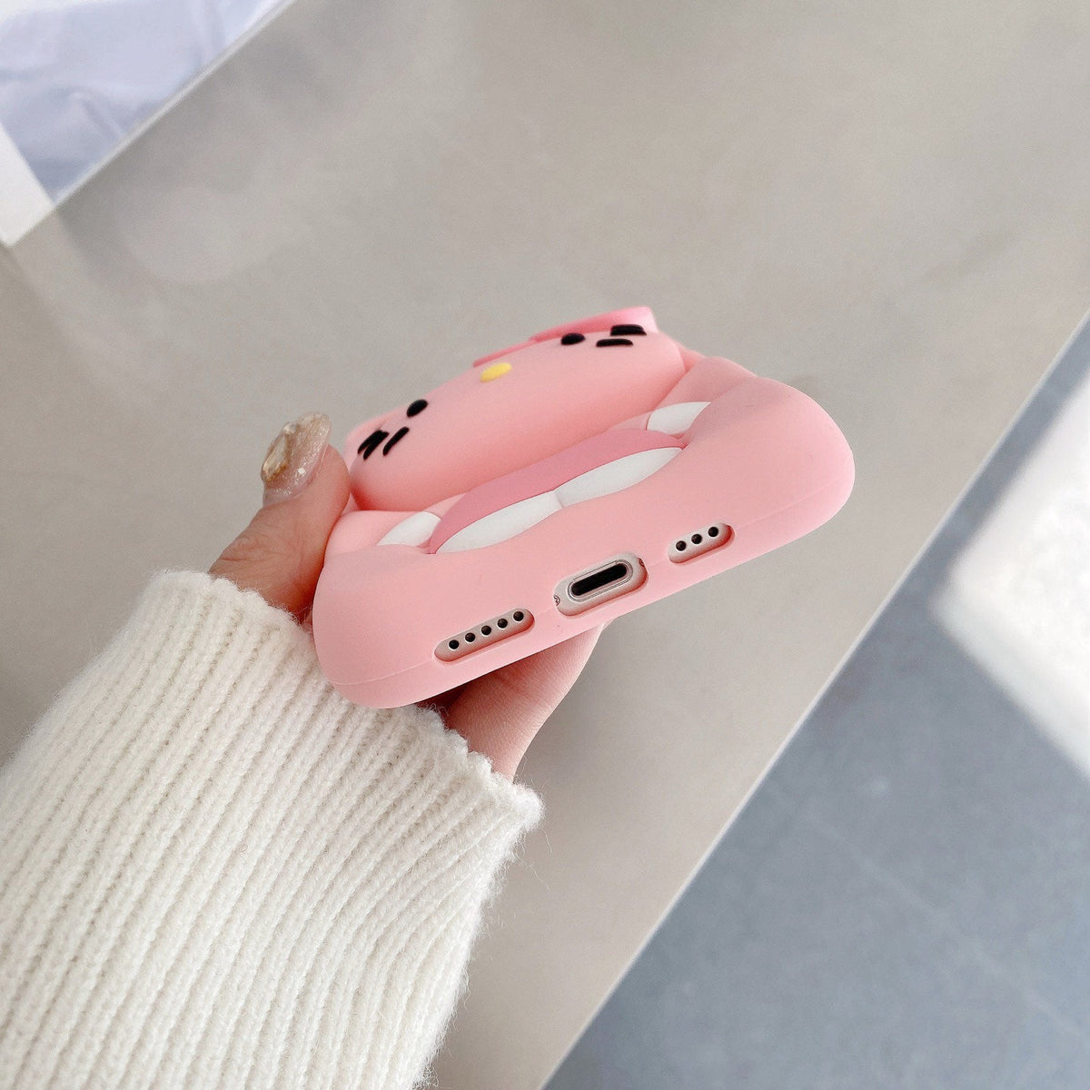 Pink Hello Kitty phone case with stand