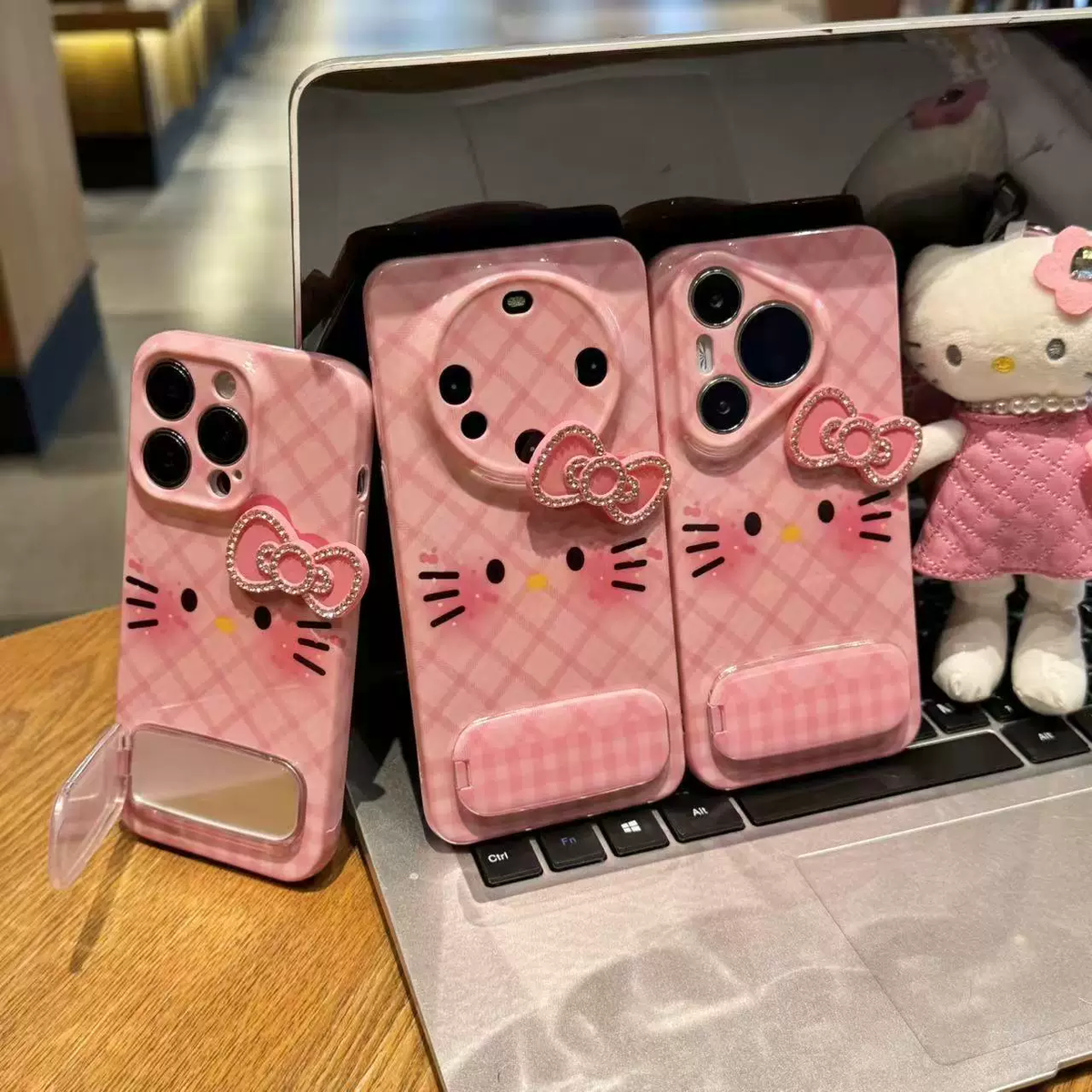 Pink checkered cat phone case with bow