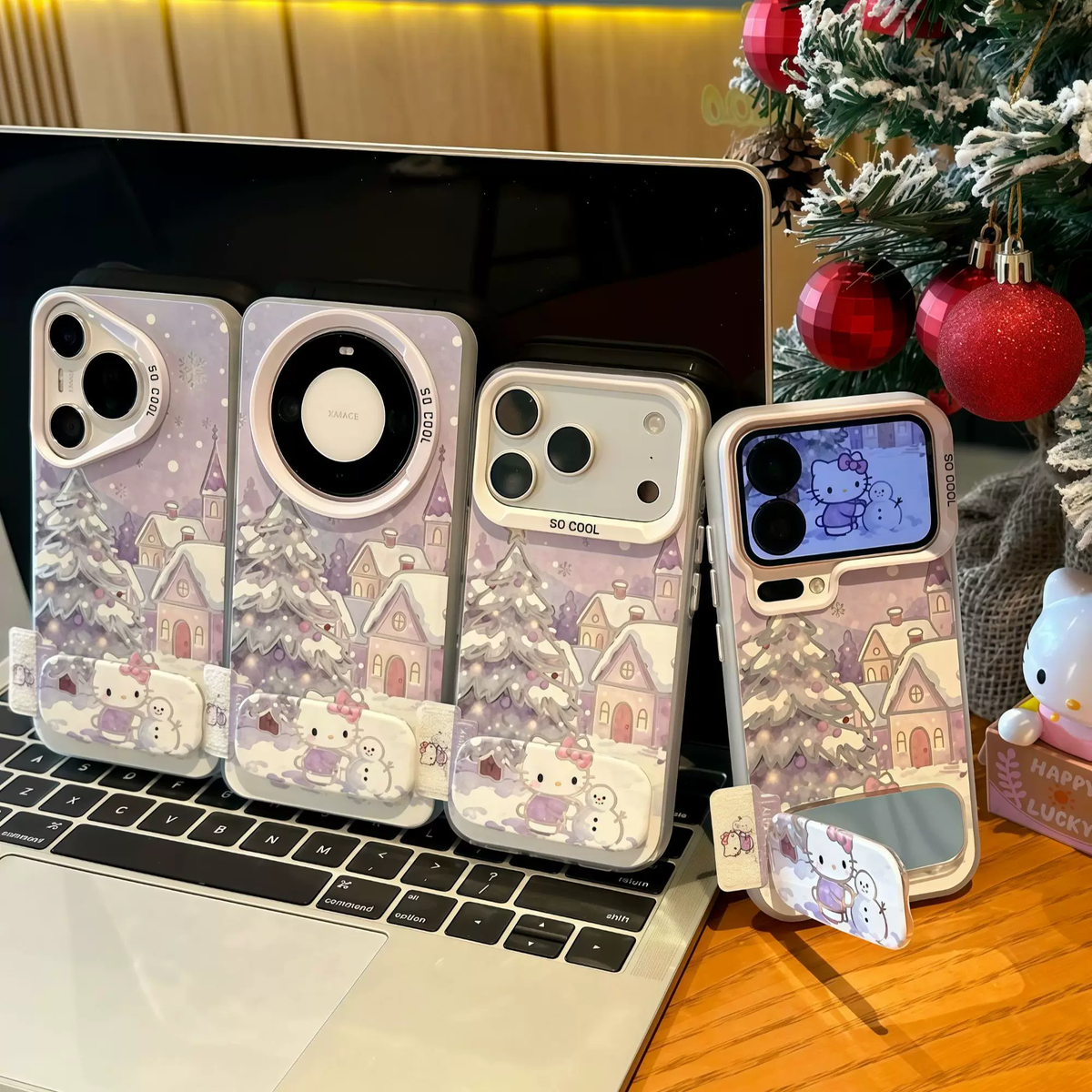 Light purple Christmas tree, snowman, and Hello Kitty phone case